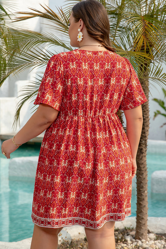 Orange Plus Size Printed Surplice Neck Empire Waist Flowy Mini Dress