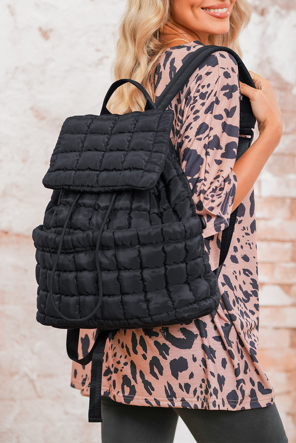 Black Solid Flapped Quilted Puffer Backpack