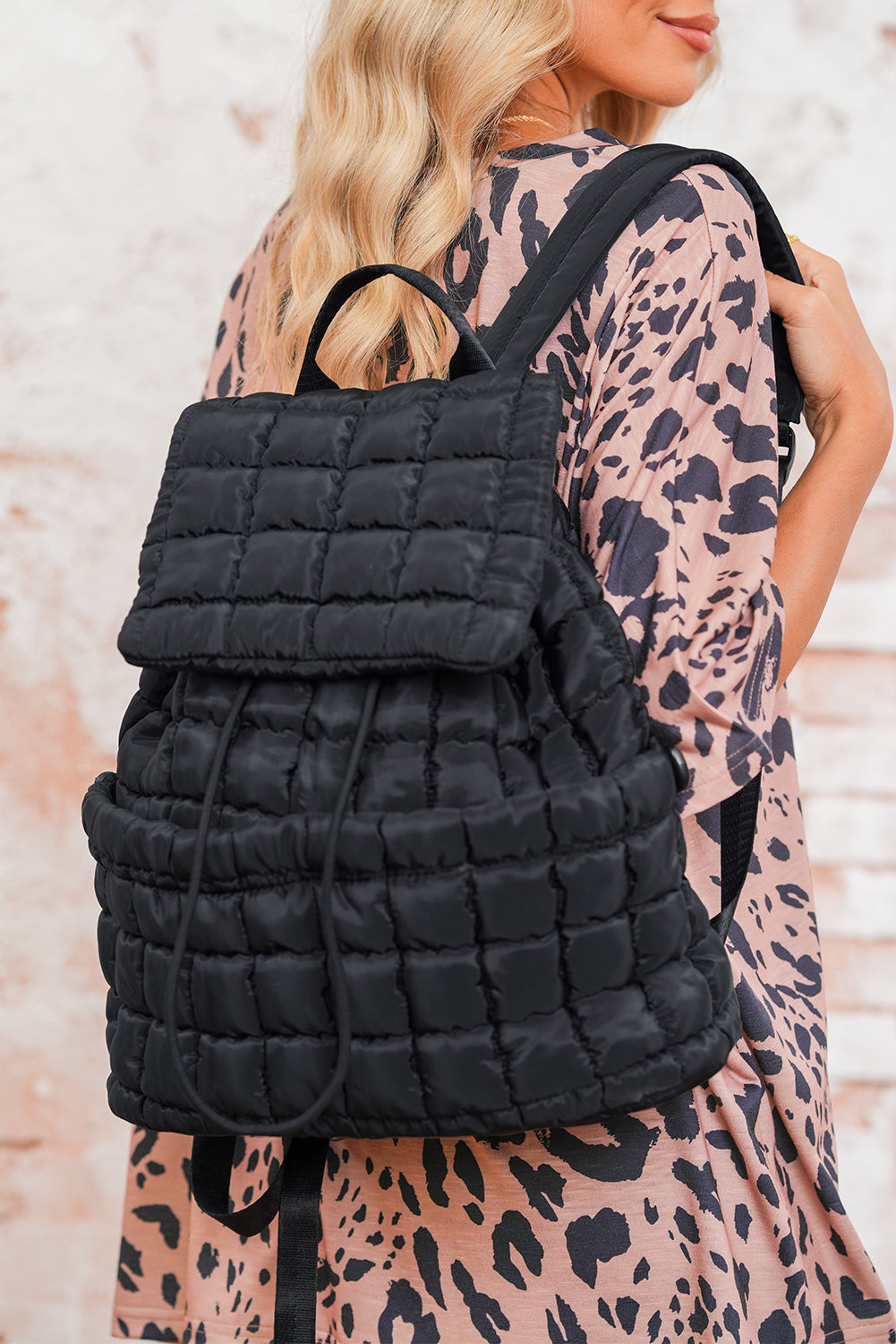 Black Solid Flapped Quilted Puffer Backpack