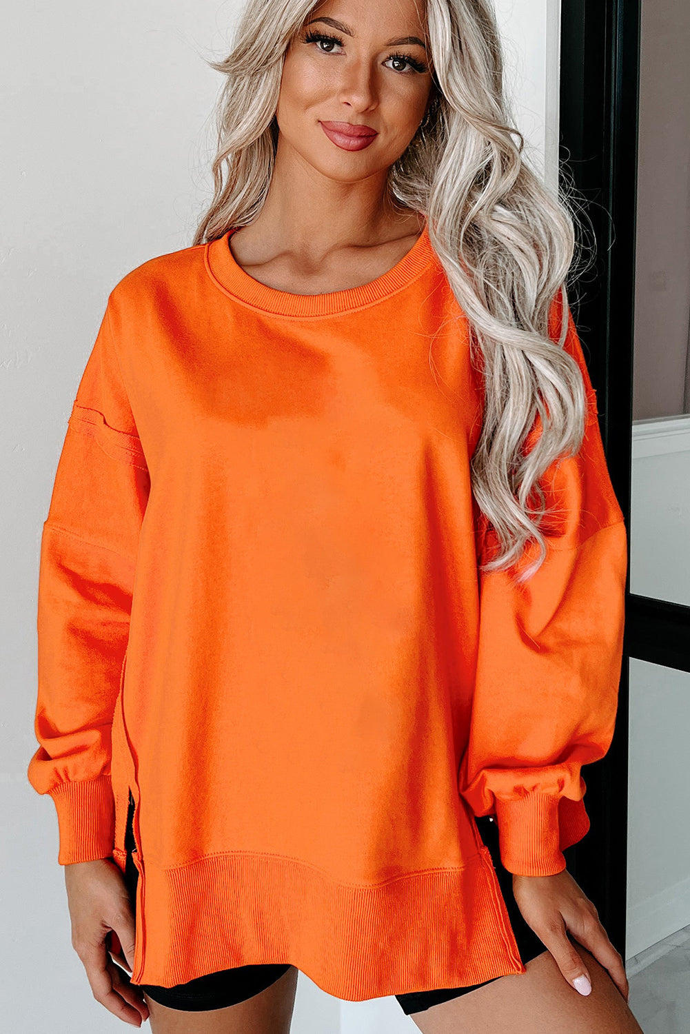 Carrot Exposed Seam Drop Shoulder Round Neck Sweatshirt with Slits