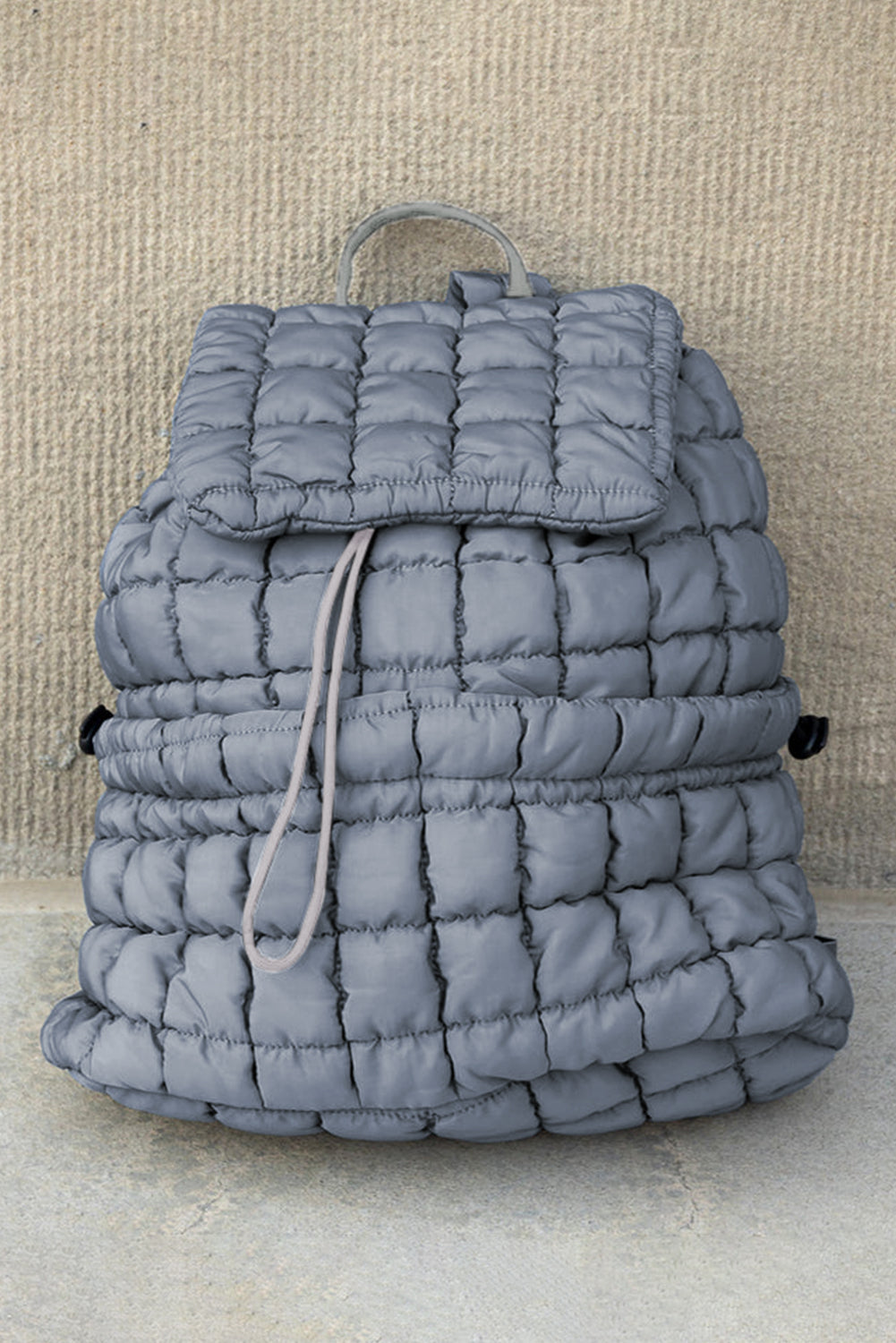 Dusk Blue Solid Flapped Quilted Puffer Backpack