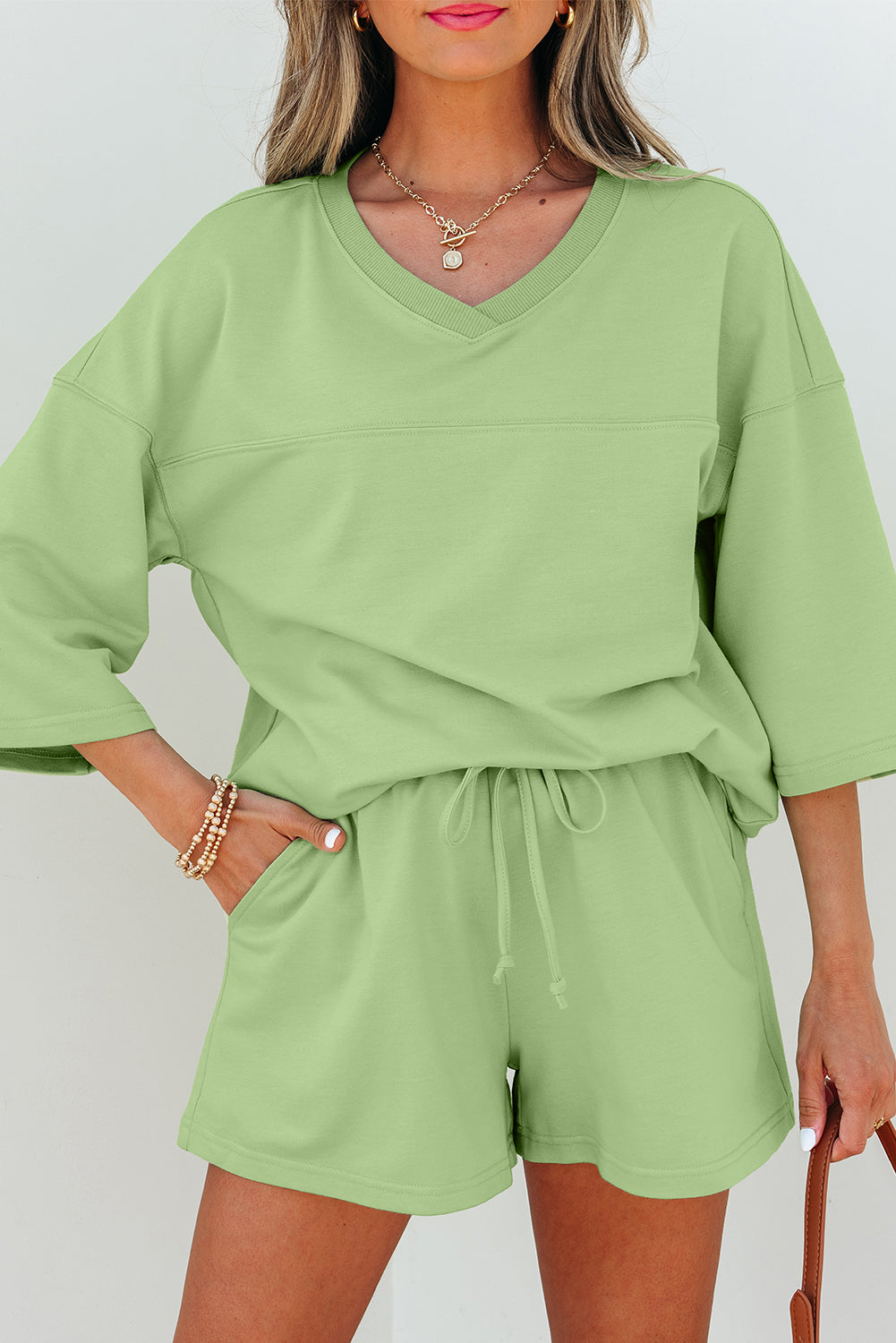 Meadow Mist Green Solid Loose V Neck Half Sleeve Tee and Shorts