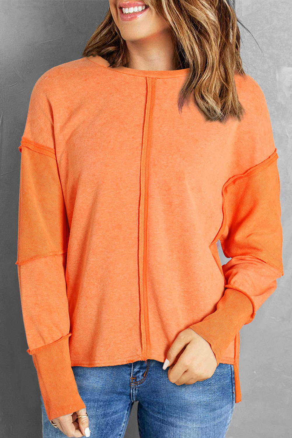 Orange Exposed Seamed High Low Raw Edge Sweatshirt